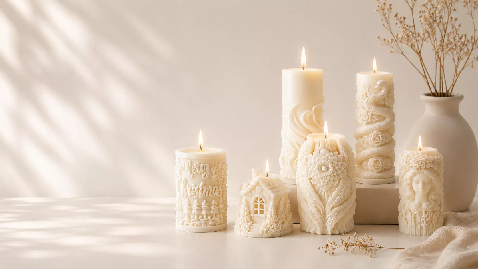 Elegant neutral-toned decorative soy wax candles with floral, angel wing, cottage house, and sculpted artistic designs displayed in a luxury beige home décor setting with soft natural lighting.