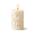 White Christmas-themed candle with 'Merry Christmas' text on a white background