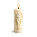 White candle with angel embossing on a white background