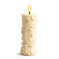Decorative candle with intricate patterns on a white background