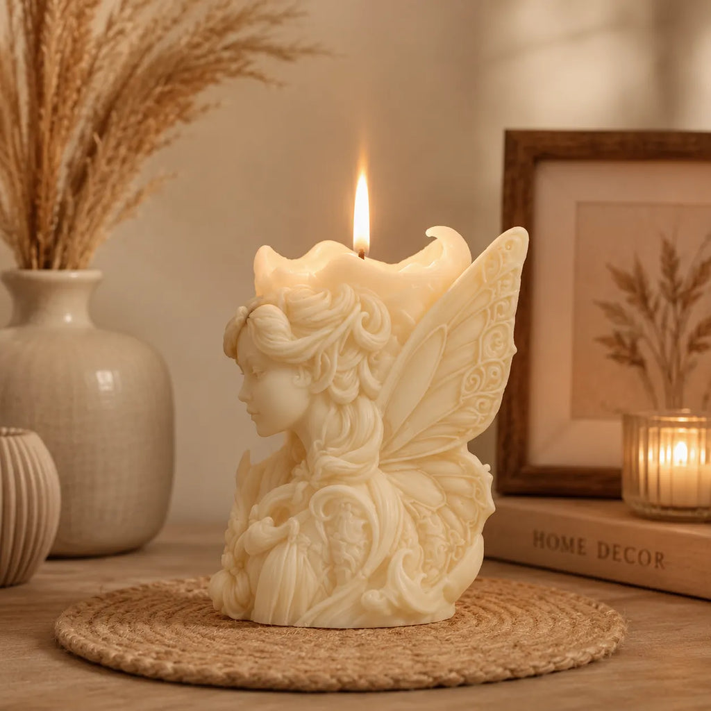 Decorative candle shaped like a fairy with a burning flame, surrounded by home decor items.