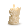 Decorative candle shaped like a fairy with butterfly wings on a white background