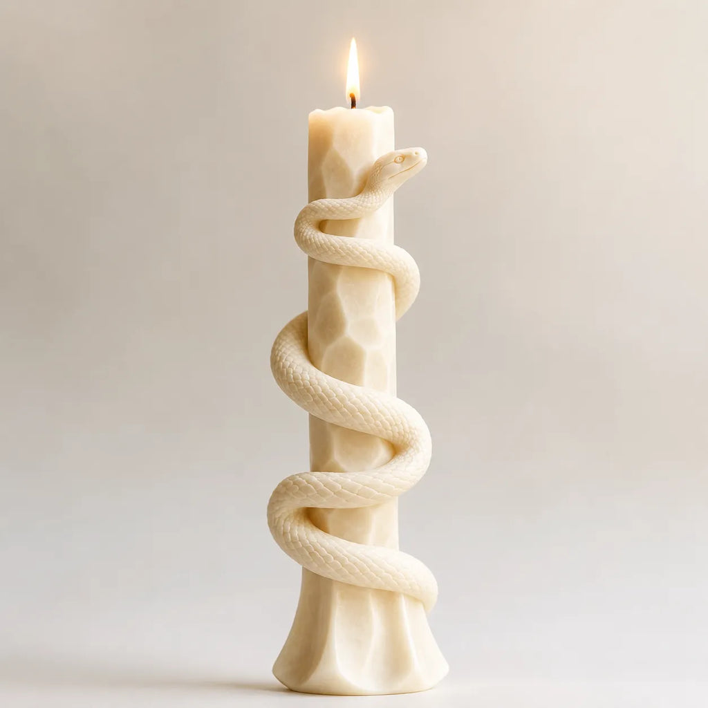 Decorative candle with twisted rope design on a plain background
