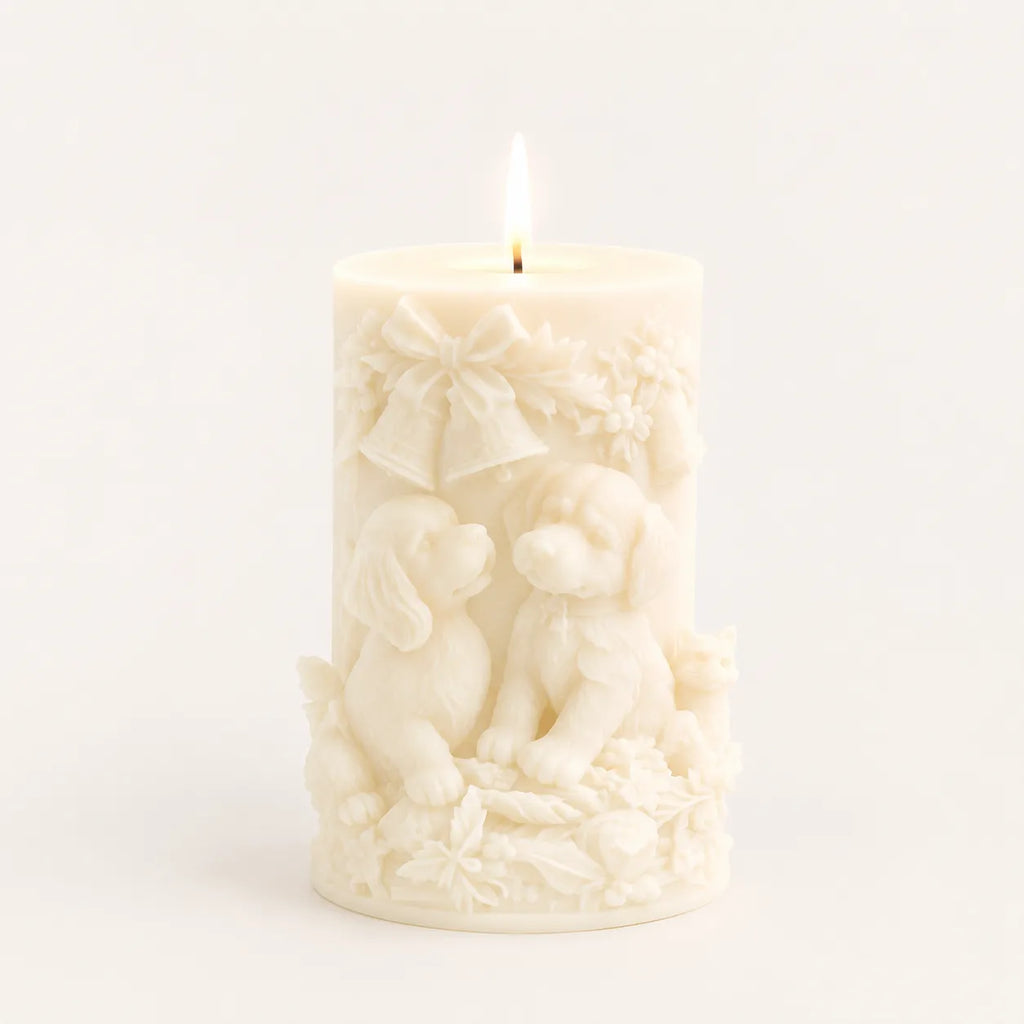 White candle with intricate design on a white background