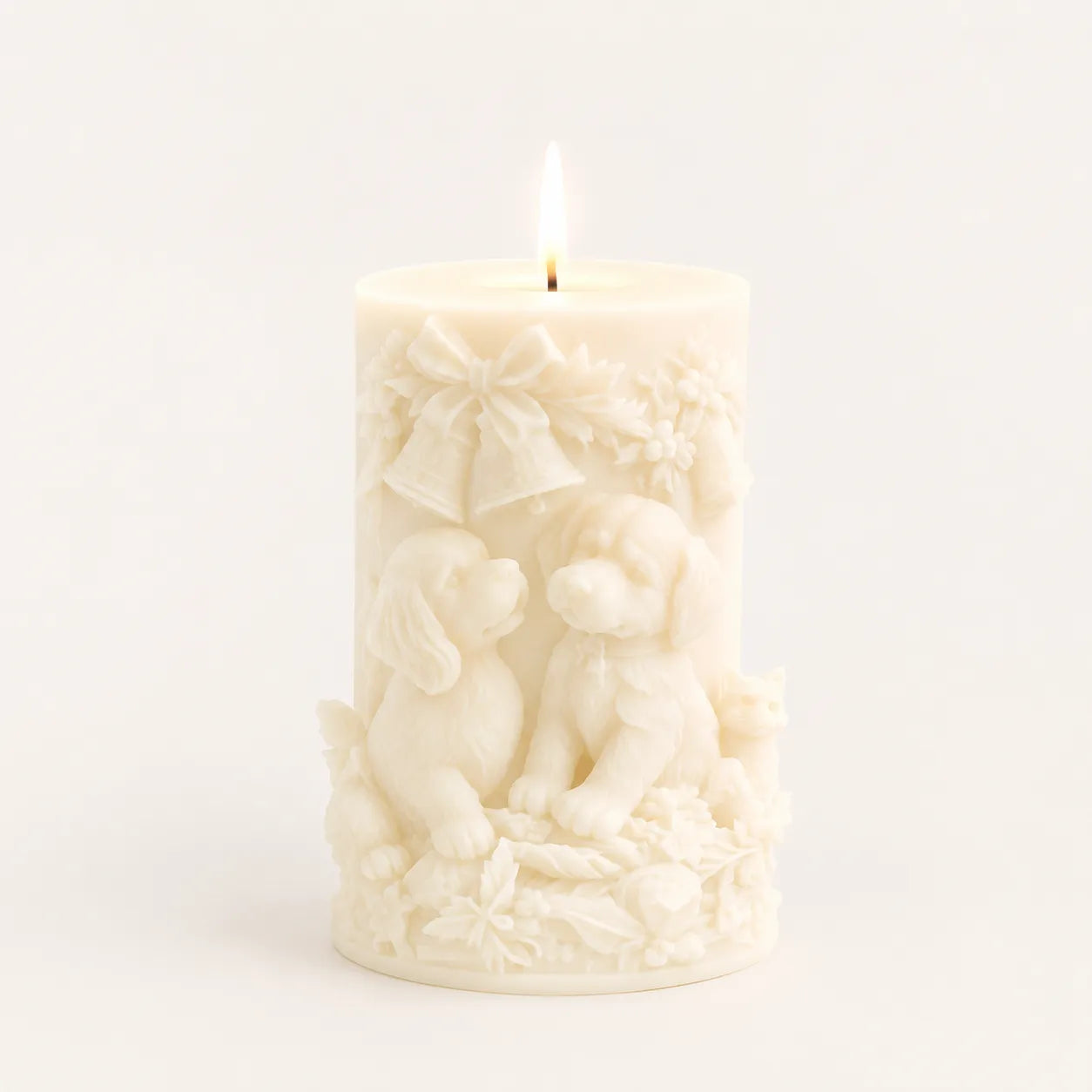 White candle with intricate design on a white background