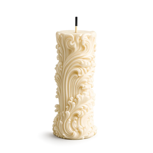 Decorative candle with intricate patterns on a white background