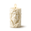 Candle with a face design on a white background