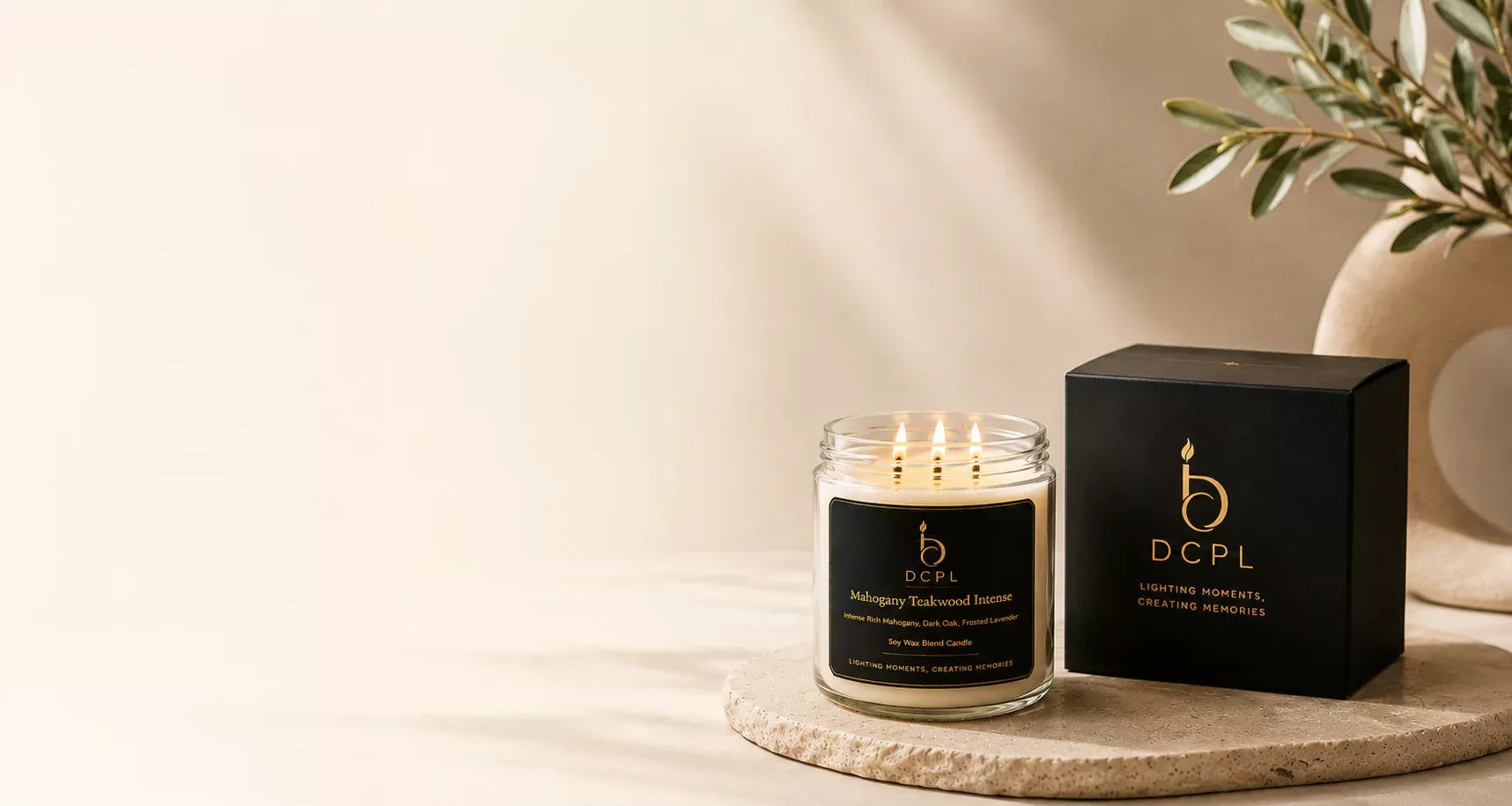 DCPL candle with packaging on a neutral background